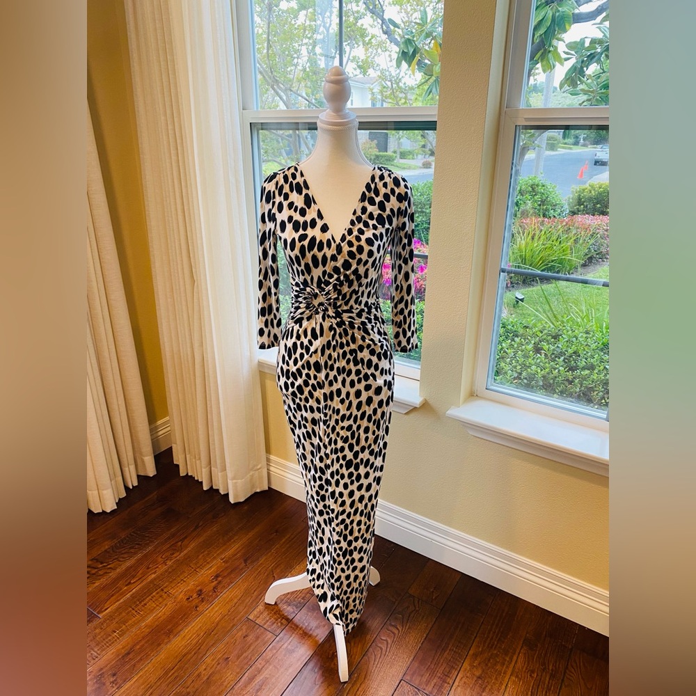 Leopard print long summer dress. Form fitting. Plunge cleavage.